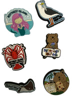 Assorted shoe charms